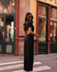 combi pantalon femme noire dos ouvert v manches courtes coupe fluide