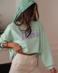 Sweat Iconic vert d'eau col rond style moderne